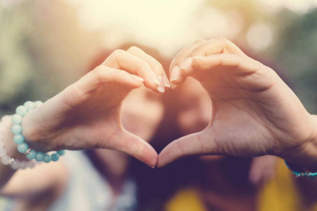 Mixed-race-girls-making-heart-symbol-with-hands-501089484_5760x3840-1.jpeg